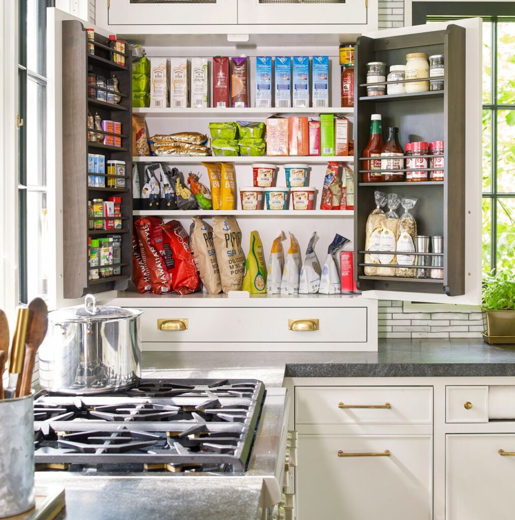 Organized pantry with labeled airtight containers for dry goods.
