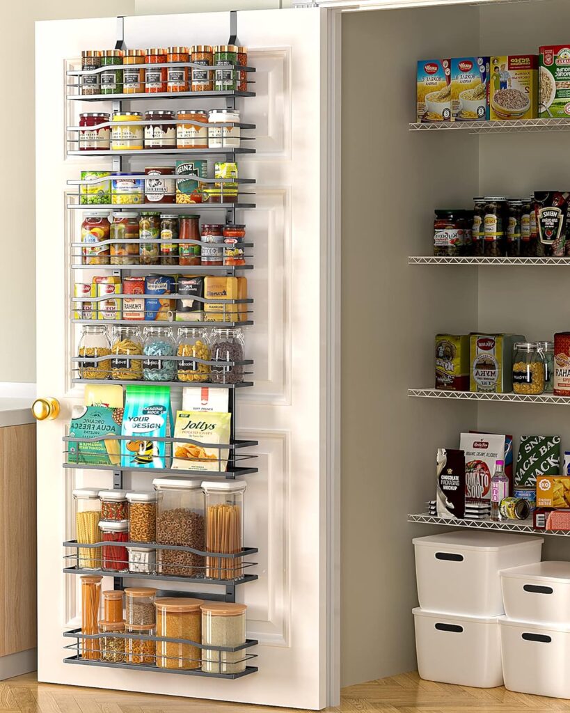 Over-the-door organizers storing spices and snacks in a small kitchen pantry